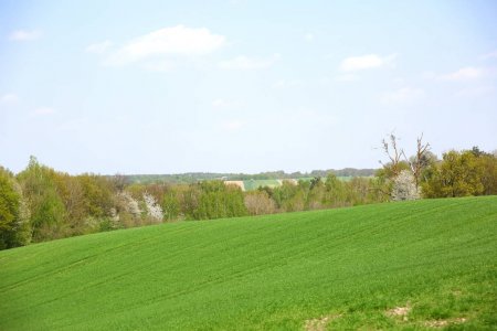 depositphotos_231052420-stock-photo-springtime-view-extensive-farmland-countryside